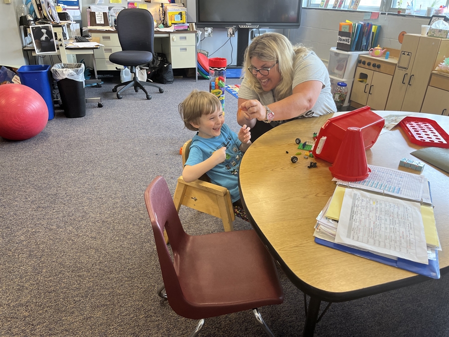 Teacher with boy student