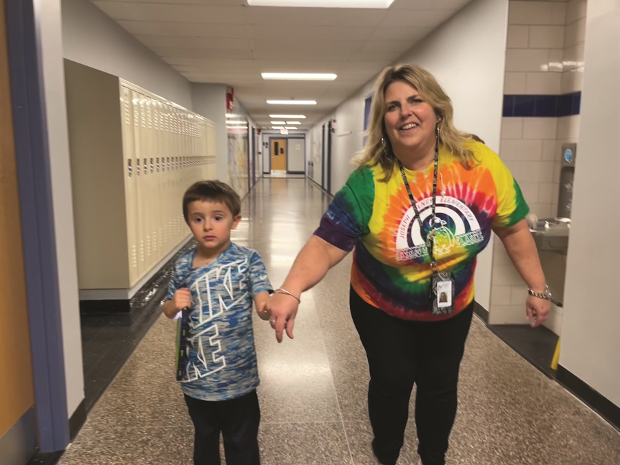 Teacher with boy student