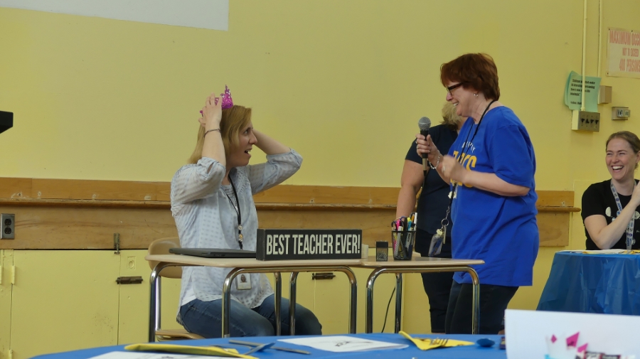 Mrs. DeLuca hears she is Educator of the Year