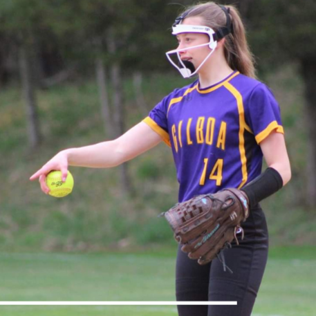 student playing softball