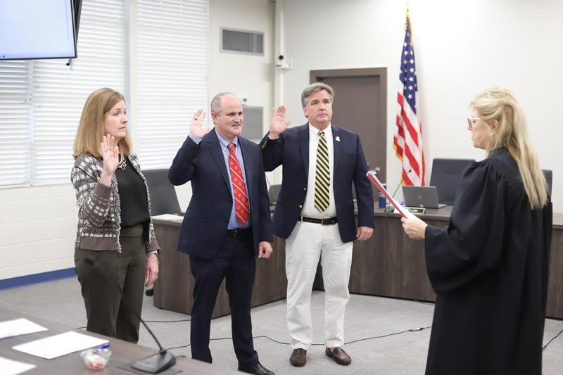 GCSS Board members Eaddy Sams, Dr. Hank Yeargan and Mike Hulsey participate in a swearing-in ceremony.