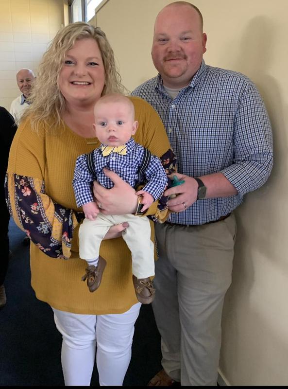 Mrs. McHargue with her son and late husband.