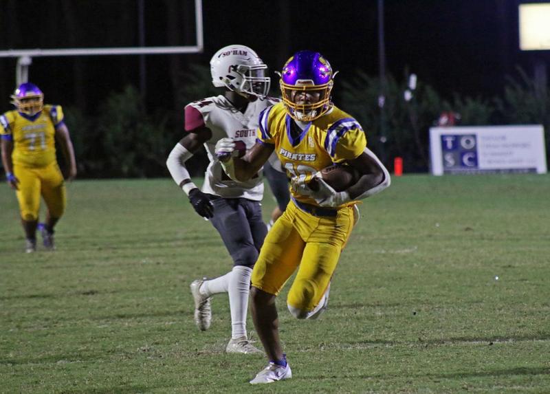 Brunswick High\'s TJ Smith catches a 39-yard touchdown pass against South Effingham at Glynn County Stadium.