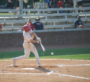 Blake Wood hits a ball for a base hit on Thursday against Grovetown.