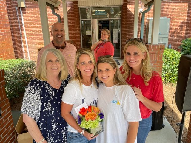 Aimee Stewart with family and colleagues.