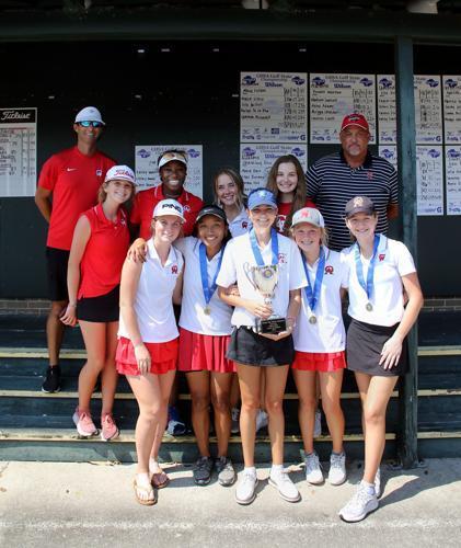 The Glynn Academy girls golf team poses for a photo after winning the GHSA Class 6A state championships.