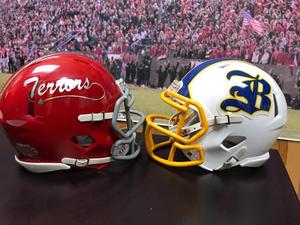 Glynn Academy and Brunswick High football helmets.