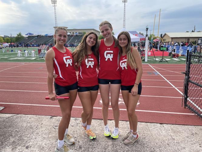 Glynn Academy\'s Sophie Speirs, Lacey Reedy, Lexi Alberson and Kelsey Lewis pose for a photo after competing in the 4x800m relay at the GHSA Class 6A Track and Field Championships in Rome.