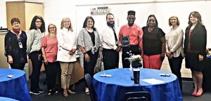 Shaheim Johnson with several teachers and administrators at the GaDOE’s virtual awards ceremony in April.