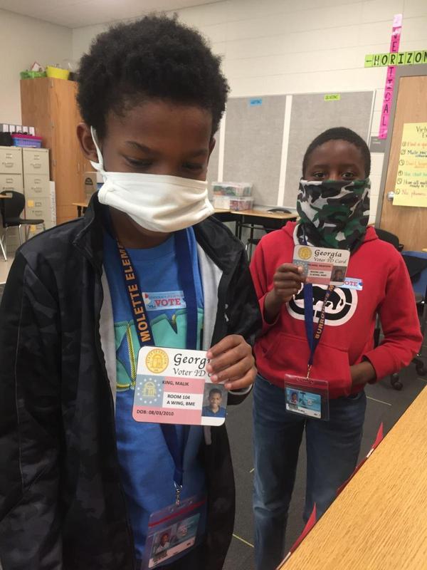 Students at Burroughs-Molette Elementary participated Monday in a mock election, which taught them about voting procedures in America.