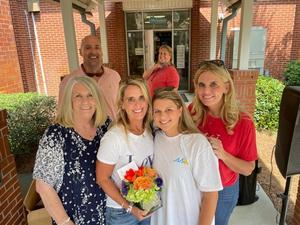 Aimee Stewart with family and colleagues.