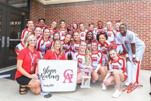 The Glynn Academy co-ed competitive cheer team poses for a photo after winning the Middle Georgia Classic in Warner Robins.