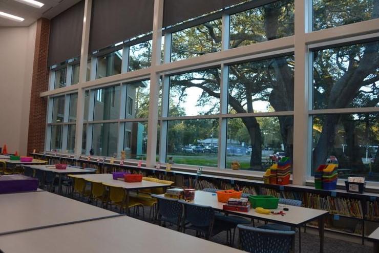 The media center in St. Simons Elementary\'s new building features a two-story window overlooking what will be the new playground.