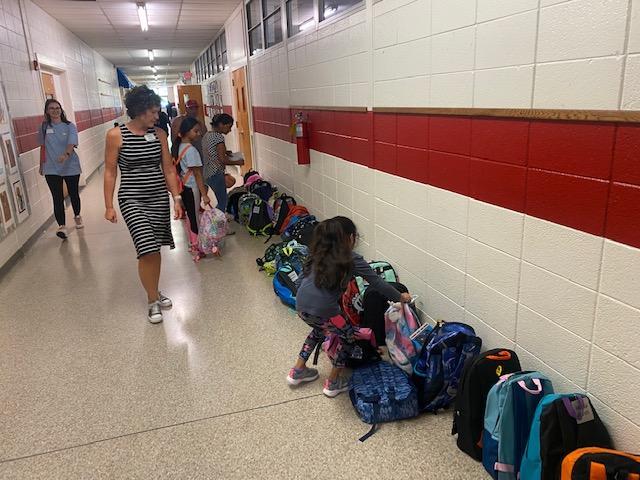 Glynn County Schools students pick up back-to-school supplies donated by the Glynn County Sheriff\'s Department.