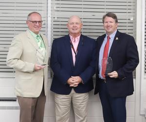 Jerry Mancil, left, Superintendent Scott Spence and Marcus Edgy.