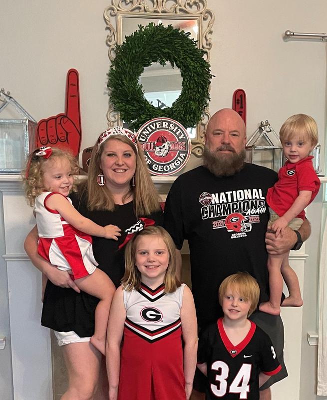 Mrs. Dixon with her family.