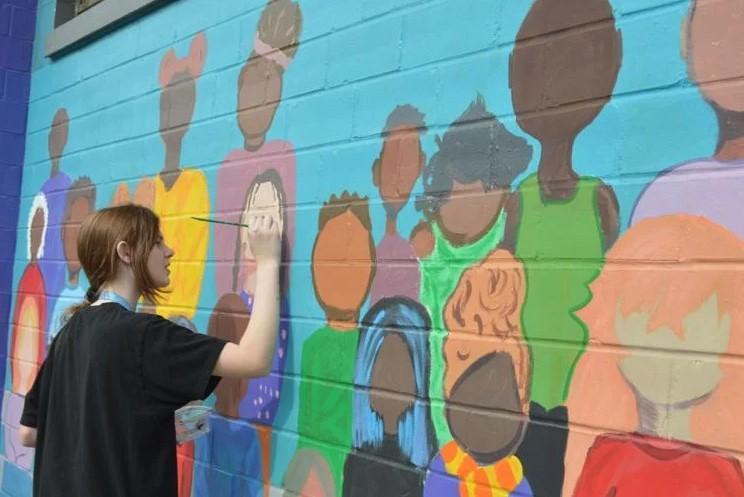 Brunswick High School students recently completed a mural at the Pinova plant in Brunswick.