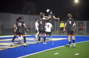 Glynn\'s Luke O\'Connor wins the header against a Wayne County defender in the teams 7-0 win.