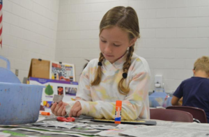 Students in Deborah Arnold\'s art class at Oglethorpe Point Elementary used copies of the Brunswick News recently to create artwork inspired by Japanese artist Yayoi Kusama