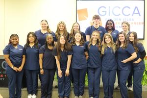 Fifteen students received their pins Friday at the Golden Isles College and Career Academy to celebrate their completion of the certified nursing assistants licensing exams. Camille Cryer, from left in the top row, Isabella Lara, Abigail Martin, Kayden Barker, Niesha Measuria and Chalsea Dixon are pictured. On the bottom row is Maria Haynes-Demery, from left, Mariella Martinez-Vasquez, Ze’Myah Andrews, Eliana Veiga, Bailey Stallard, Emma Scalese, Ashlynne Kamin, Hannah Harvey and Alexa Herbert.