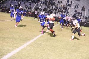Glynn Academy’s Zech Ellis carries the ball against Bradwell Institute on Friday in Hinesville.