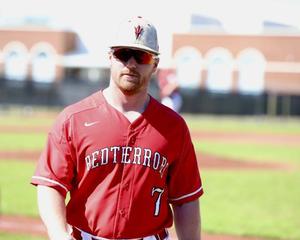 Glynn Academy head coach John Welborn walks towards the dugout during a recent game at Wainwright Field.