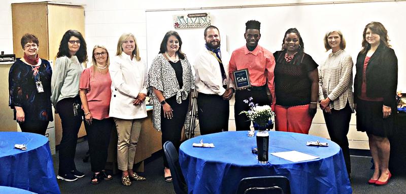 Shaheim Johnson with several teachers and administrators at the GaDOE’s virtual awards ceremony in April.