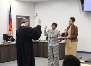 Ms. Audrey Gibbons with a family member.