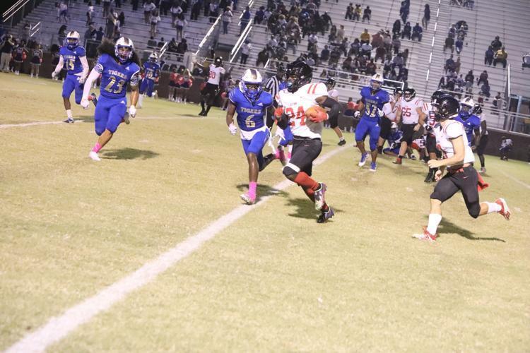 Glynn Academy’s Zech Ellis carries the ball against Bradwell Institute on Friday in Hinesville.