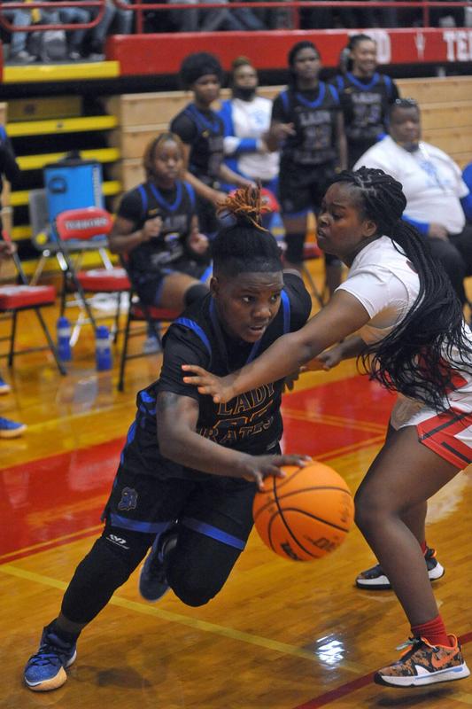 Brunswick High\'s Shakardia Cowart drives against Glynn Academy during the City Championship on Saturday at The Glass Palace.