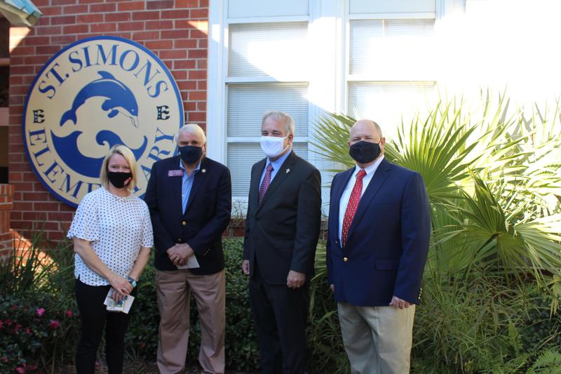 St. Simons Elementary Principal Katy Ginn with state Rep. Don Hogan, State Superintendent Richard Woods and Glynn County Schools Superintendent Scott Spence.