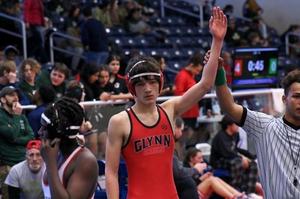 Glynn Academy\'s Aiden Mills wins a match at the Port City Memorial at Brunswick Square Garden on Jan. 28.