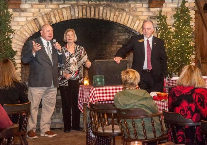 Glynn County Schools Superintendent Scott Spence, left, answers a question from the Golden Isles Republican Women\'s Club at Bennie\'s Red Barn as club member Ruby Robinson, middle, and State Schools Superintendent Richard Woods listen.