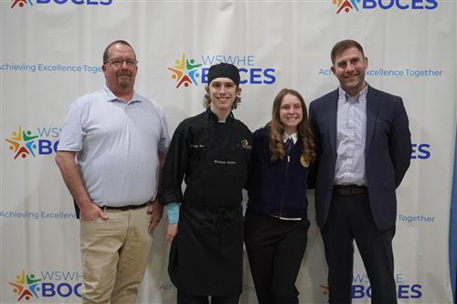 Superintendent Cook and Mr. Fish with William Babicz & Kallie Knoll