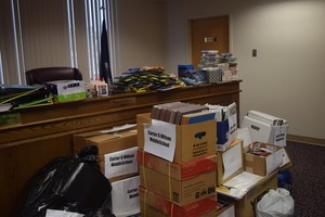 School supplies for the middle and high schools fill the board room on August 29
