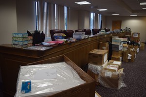 The donations totaled over $7,000 and filled the board room on August 29
