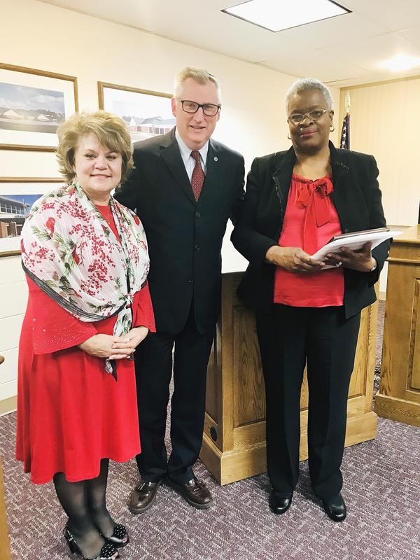 Sandra Morton pictured with Dr. Hackney and Mr. Reber.