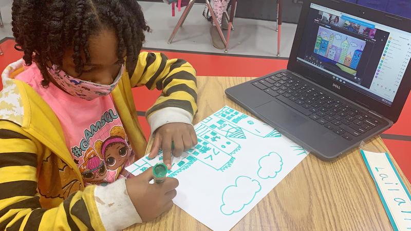child doing schoolwork