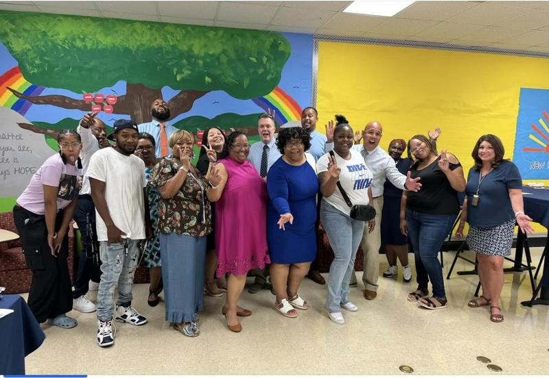 NHA Staff with parents