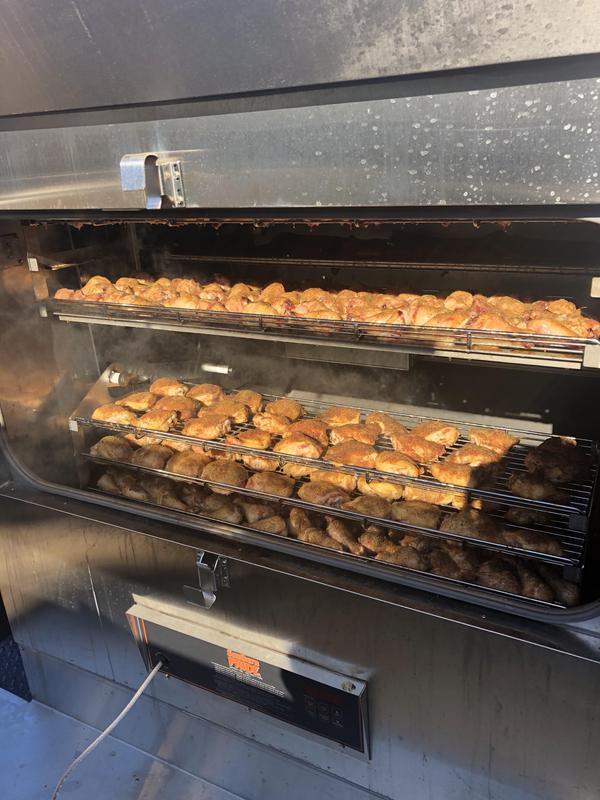 Smoked chicken in smoker.