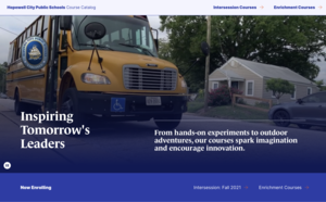 the image is a screen shot of the HCPS intersession course catalog. there is a photo of a yellow bus on a blue background. there are the words \"inspiring tomorrow\'s leaders\" on the photo. there are link to enrichment courses and intersession courses.