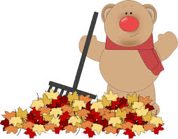 a bear raking leaves