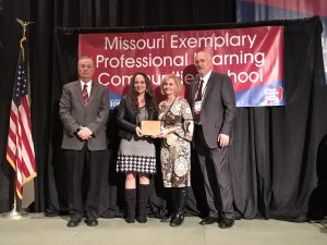 Dogwood Elementary staff members accept Exemplary PLC School award at Powerful Learning Conference