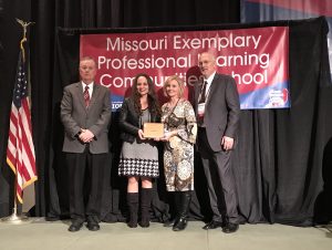 Janelle Nelson and Kasey Stegall receiving Missouri Exemplary School Award