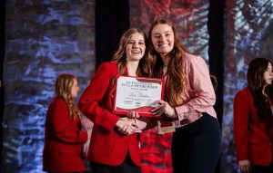 KHS senior Lexie Barton receives scholarship from the Missouri FCCLA organization.