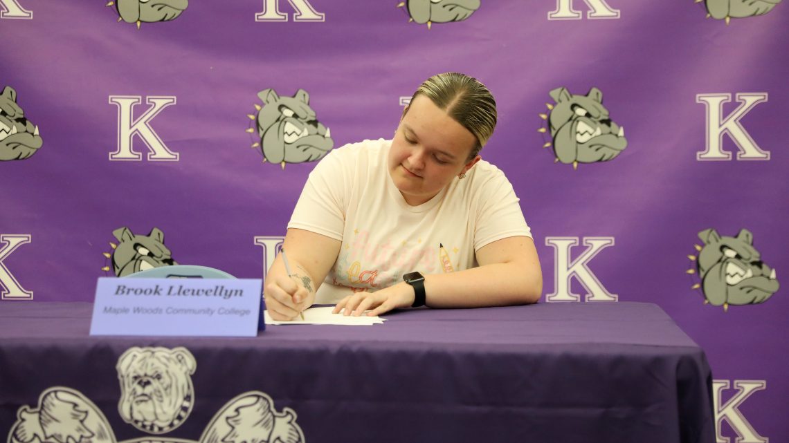 A Kearney High School student signs a letter of intent to study education in college.