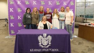 Kearney High School Education Internship students pose with teacher Mendy Salmonson following the school's Future Educator's Signing Day ceremony.