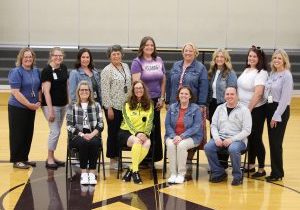 Current and former LENS faculty members pose for a photo following a celebration of the school on April 25, 2025.