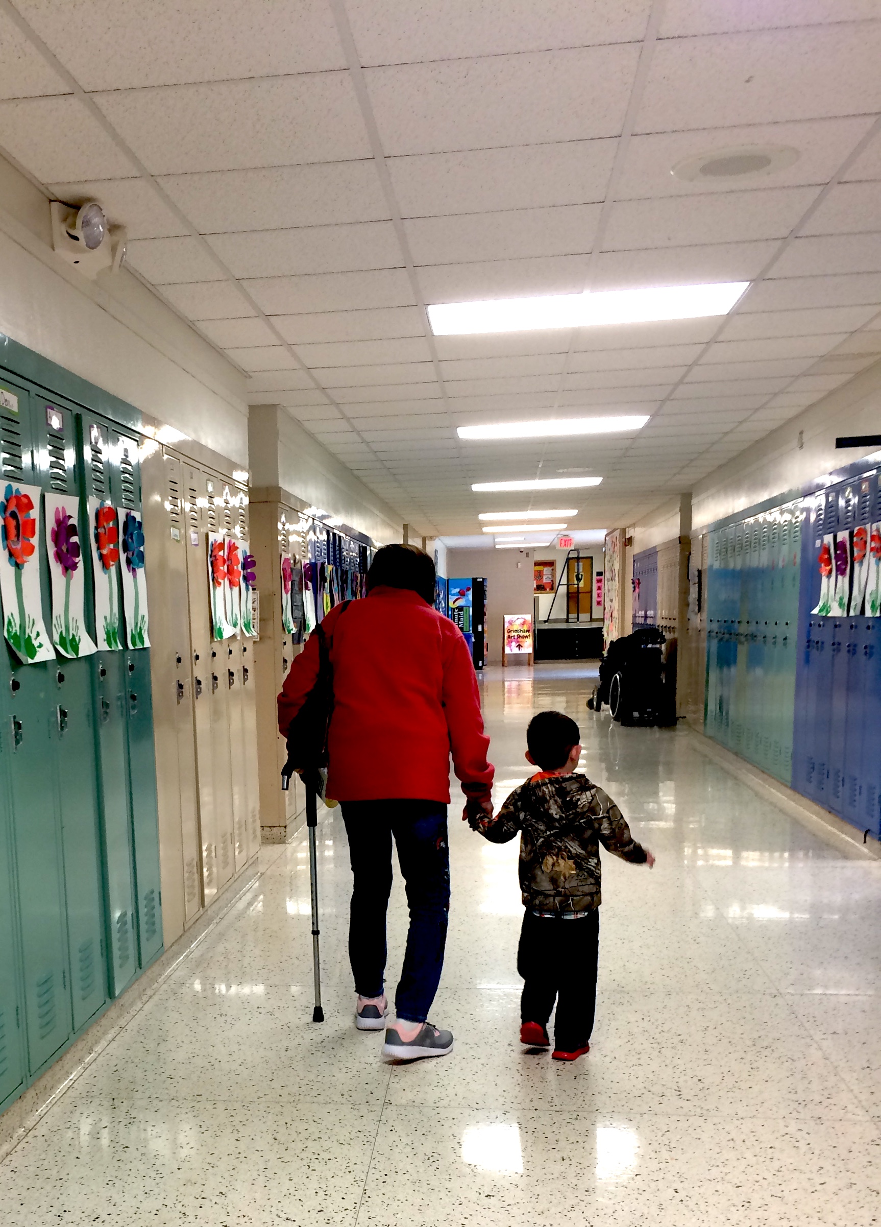 students and guests tour the school