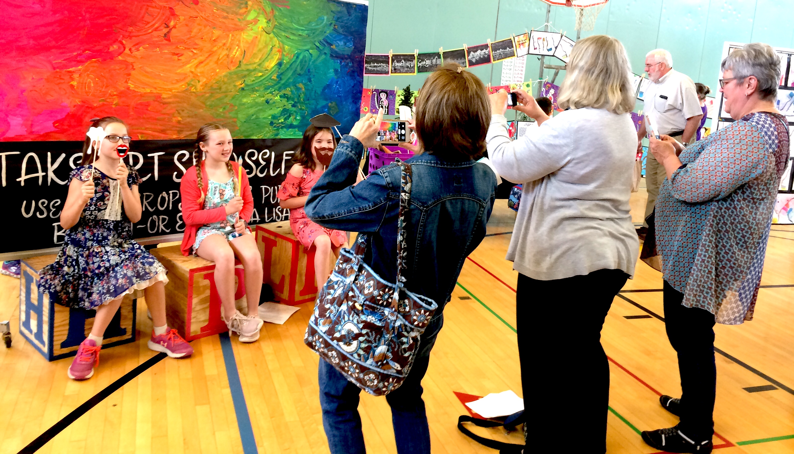 students pose for portraits